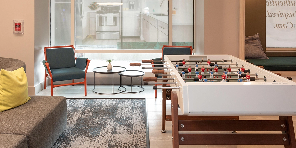 resident clubhouse featuring a foosball table