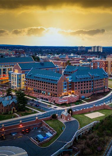 Building with sunset behind